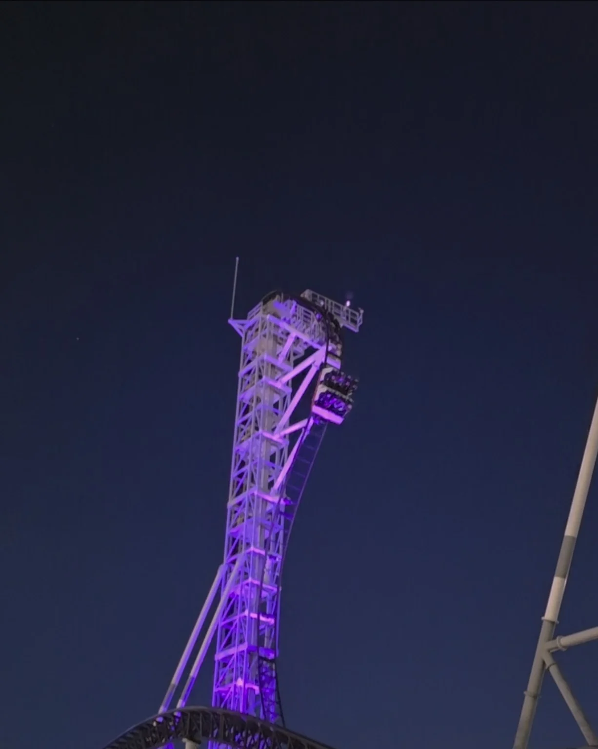 Takabisha’s steep drop illuminated in purple at night