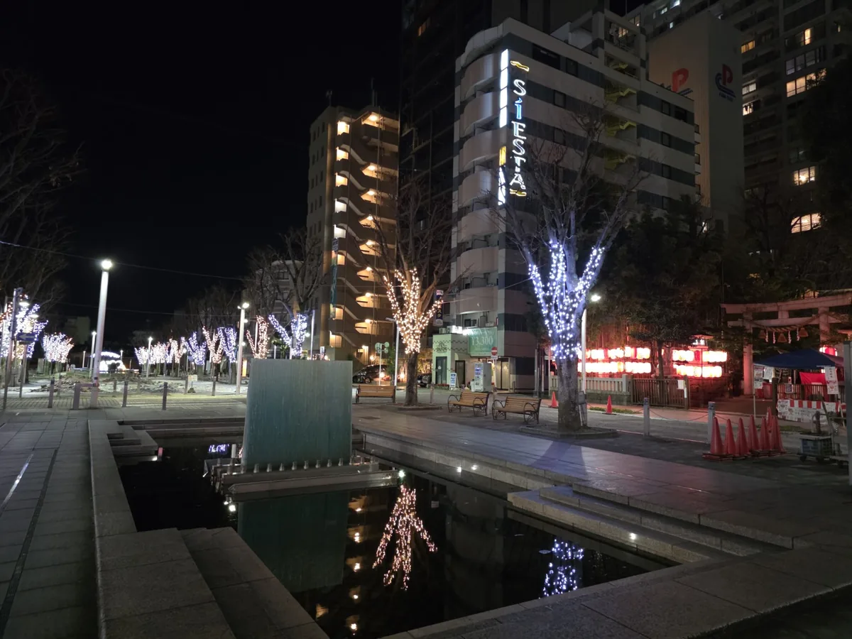 Winter lights reflected beside Aoba Symbol Road