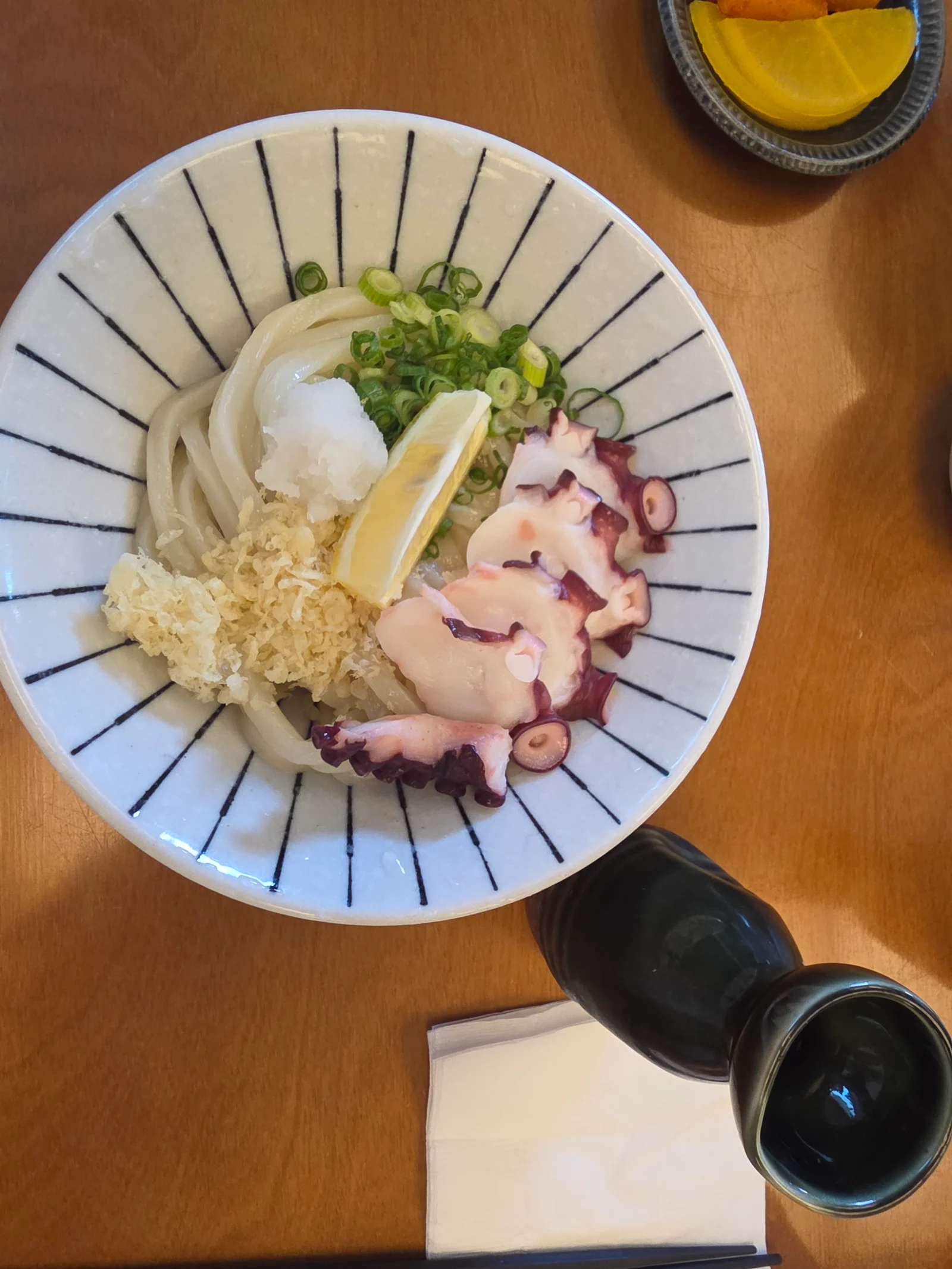 Bukkake udon topped with octopus and scallions at Udongdang