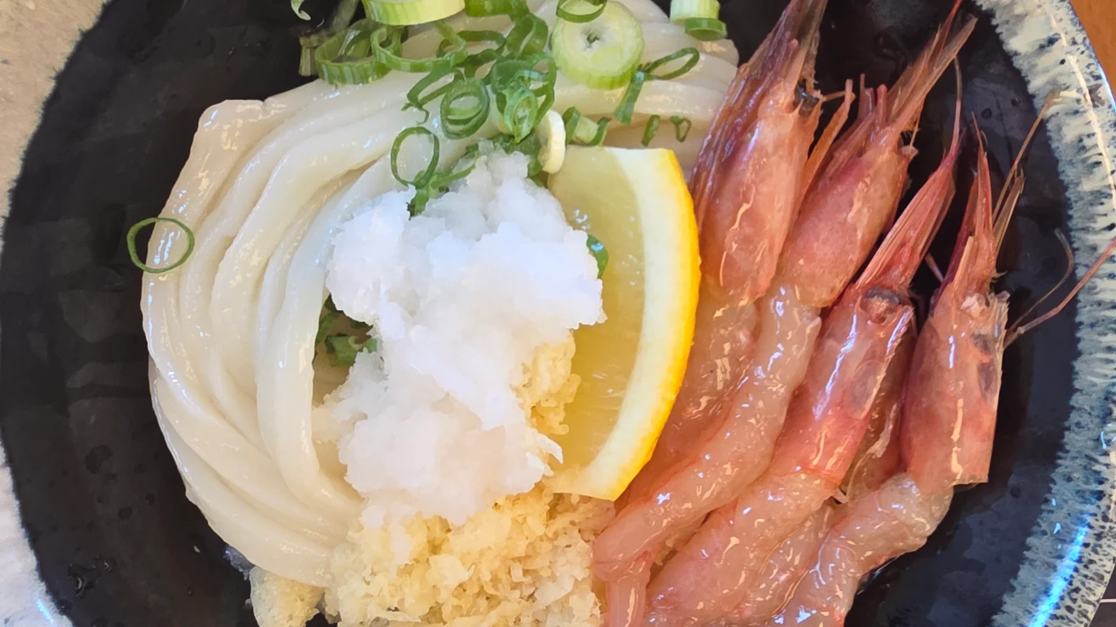 Bukkake udon topped with sweet shrimp and scallions at Udongdang